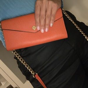 Michael Kors crossbody wallet on a chain